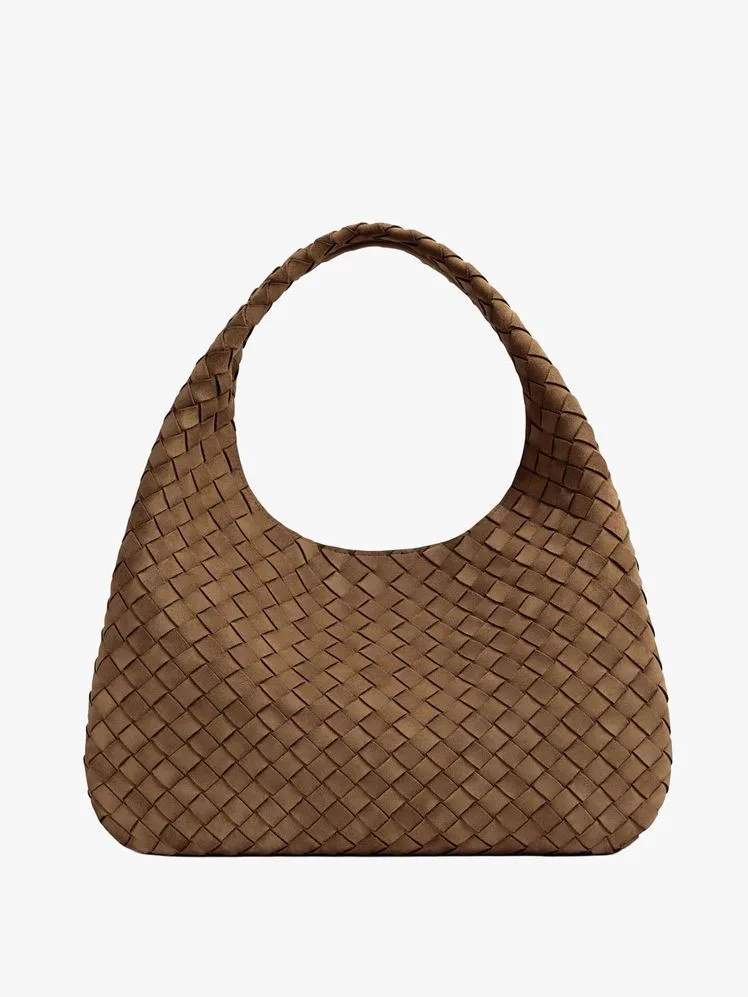 Celebrity Style: How Lauren Hutton Made the Bottega Veneta Clutch a Fashion Icon